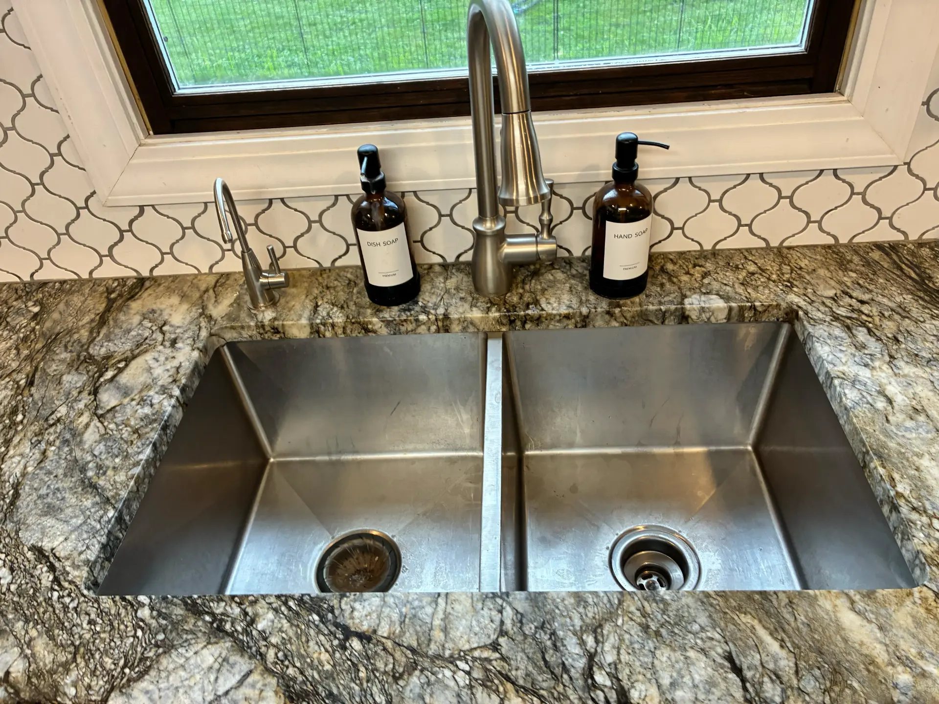 Sink, faucet & backsplash cleaned by Upkeep Standard in Huntley, Illinois