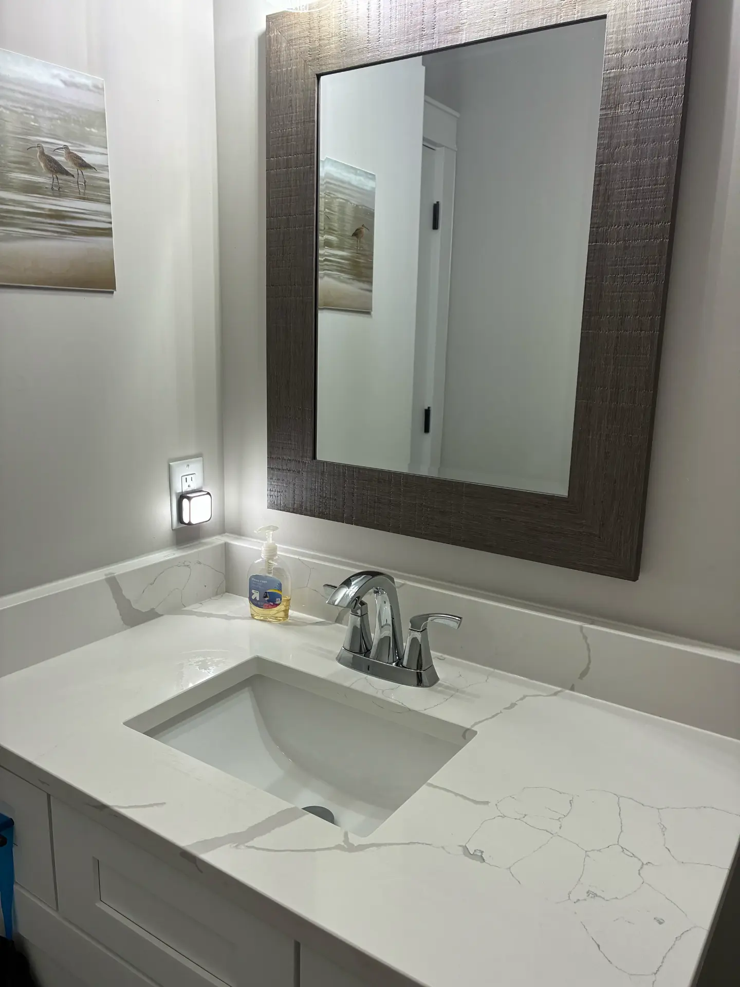 Vanity, sink & mirror cleaned by Upkeep Standard in Elgin, Illinois